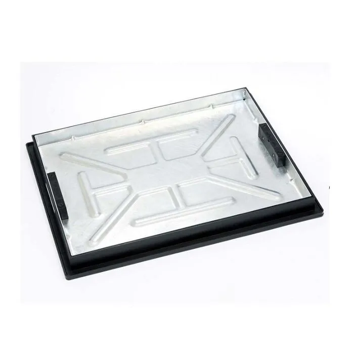 The Clarke 600mm x 450mmRecessed Manhole Cover & Frame Locking Recessed 5T is a rectangular metal cover with raised geometric patterns and a black border, shown on a white background.