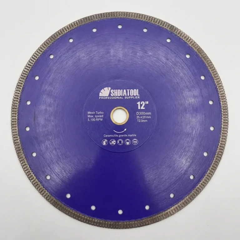 A large, circular, blue Diamond Porcelain Cutting Blade 300mm x 25.4mm to 20mm bore with metal edges and evenly spaced holes, designed for cutting ceramic, granite, and marble.