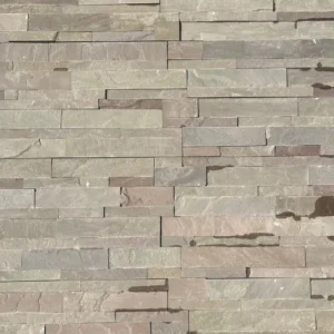 The Raj Green Stone Cladding displays rectangular slabs in a textured stone wall, showcasing a mix of beige, brown, and gray hues arranged in an irregular pattern reminiscent of cobble setts.